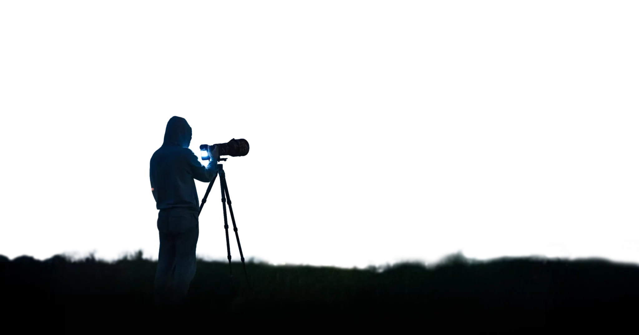 Silhouette d’un photographe avec trépied sur fond blanc